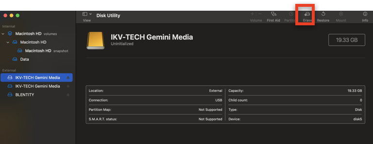 In MacOS disk utility，click 'Erase' on the top right corner to format